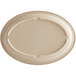 An Acopa Foundations tan melamine oval platter with a narrow rim.