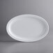 An Acopa Foundations white melamine oval platter on a white background.