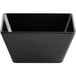 An Acopa Rittenhouse black square melamine bowl with a white background.
