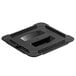 A black plastic lid with a handle on a black plastic food pan.