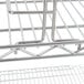 A metal Eagle Group wire tray rack for shelving.