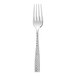 A Fortessa Lucca stainless steel serving fork with a textured handle.