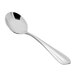A close-up of a Fortessa stainless steel bouillon spoon.