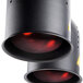 A black Avantco countertop heat lamp with red bulbs over food.