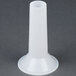 A white plastic cylindrical funnel with a white cap.