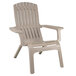 A taupe plastic Grosfillex outdoor Adirondack chair with armrests.