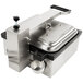 The Vollrath Cayenne Single Panini Sandwich Press with Grooved Non-Stick Plates on a stainless steel machine with a black handle.
