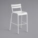 A white Lancaster Table & Seating outdoor barstool with a metal frame and white seat.