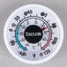 A white round Taylor stick-on thermometer with black and red text.