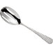 An Acopa stainless steel slotted serving spoon with a handle.