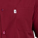 A close up of a burgundy Uncommon Chef classic cook shirt.