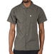 An olive green men's short sleeve cook shirt with a front pocket.