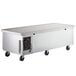A Beverage-Air stainless steel 4 drawer refrigerated chef base with wheels.