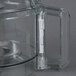 A clear plastic Robot Coupe cutter bowl with a handle and a lid.