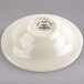 An ivory Homer Laughlin China fruit bowl with a logo on it.
