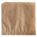 A brown paper bag with a scalloped edge.