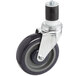 A black and grey Polyurethane Work Table and Equipment Stand caster wheel with a metal base.