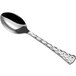 A Visions silver plastic spoon with a textured handle.