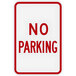 A white rectangular aluminum sign with red text that says "No Parking" in diamond grade reflective material.