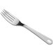 A Visions silver plastic fork with a white handle.