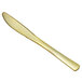 A Visions gold plastic knife with a classic design.