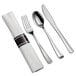 A Visions pre-rolled white linen-feel napkin with silver plastic cutlery including a fork, knife, and spoon.
