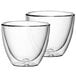 Two Villeroy & Boch clear glass Artesano Barista cups on a white background.