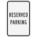 A white rectangular Lavex "Reserved Parking" sign with black text.