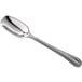 A stainless steel scoop spoon with a long silver handle and a silver scoop.