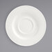 A white porcelain saucer with a circular center.