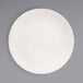 A Front of the House European White porcelain plate with circular lines on the edge.