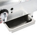 A stainless steel APW Wyott CharRock Charbroiler on a countertop in a professional kitchen.