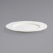 A Front of the House Catalyst Classic European White porcelain plate with a wide rim.