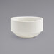 A Front of the House Monaco white porcelain bouillon bowl on a gray surface.