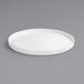 A white Front of the House Soho porcelain platter with a raised rim on a gray surface.