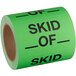 A roll of Lavex green matte paper labels with black text that reads "Skid Of"