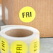 Lavex Industrial 2" Friday Yellow Matte Paper Permanent Inventory Day Label - 500/Roll Main Thumbnail 1
