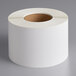 A roll of white Lavex direct thermal labels.