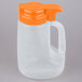 A white plastic Tablecraft dispenser jar with an orange handle and lid.