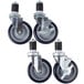 A set of four heavy duty zinc swivel stem casters with rubber wheels.