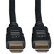 A close-up of two Tripp Lite black HDMI cables with black plugs.