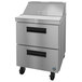 A Hoshizaki stainless steel refrigerated sandwich prep table with 2 drawers.