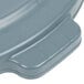 A close up of a grey Rubbermaid Brute lid.