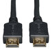 A close-up of a Tripp Lite black HDMI cable with gold connectors.