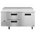 A stainless steel Hoshizaki pizza prep refrigerator with 2 drawers and 1 door.