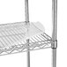 A metal wire shelf with an Alera clear plastic shelf liner.