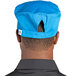 A Uncommon Chef cobalt blue chef skull cap with black accents.