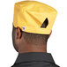 A Uncommon Chef Epic Sunflower chef skull cap with a yellow brim.