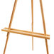 A wooden Aarco rosewood easel.