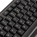 An Innovera slimline black USB keyboard with white letters on the keys.